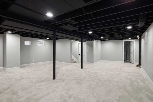 basement featuring carpet floors