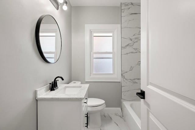 full bathroom with vanity, toilet, and  shower combination