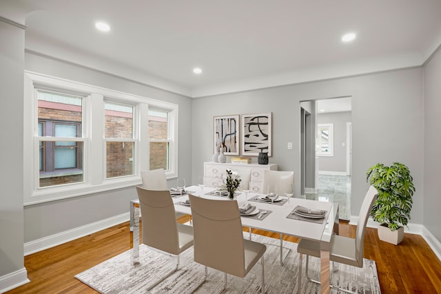 dining space featuring hardwood / wood-style floors