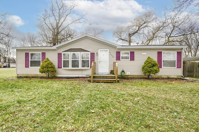 view of front of home featuring a front yard