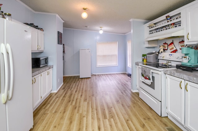 kitchen with a textured ceiling, white appliances, crown molding, light hardwood / wood-style flooring, and white cabinetry