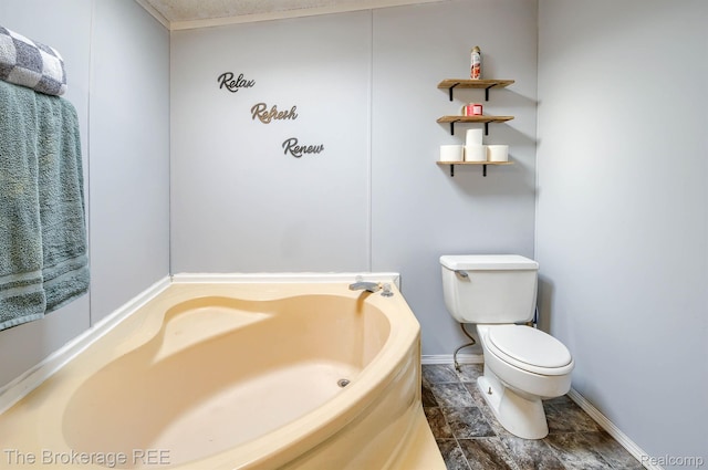 2350 Iowa Ave, Saginaw, MI 48601 - bathroom featuring a garden tub and toilet