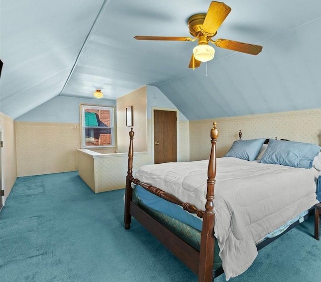 carpeted bedroom featuring lofted ceiling and ceiling fan