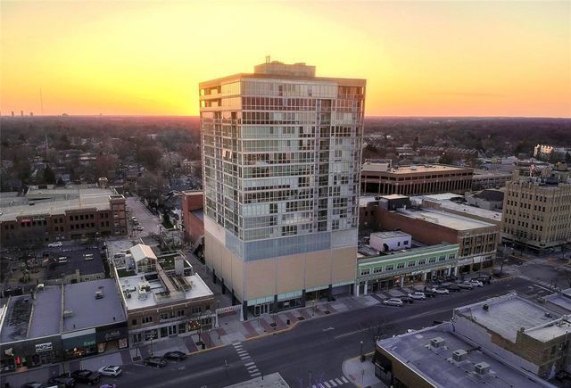 view of outdoor building at dusk