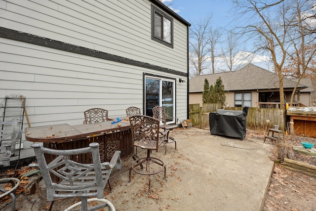 view of patio featuring a grill