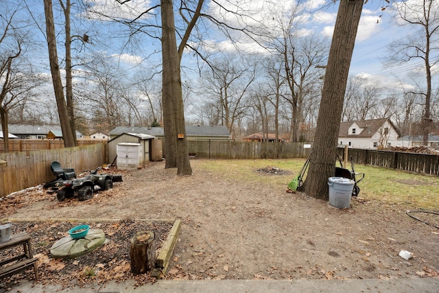 view of yard with a storage shed