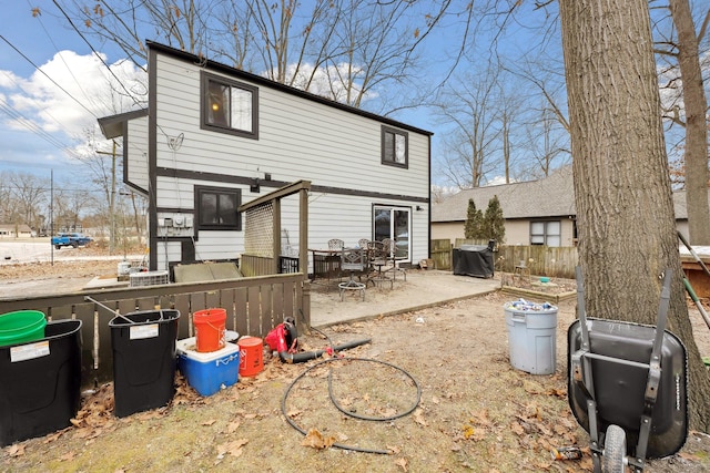 rear view of house featuring a patio area