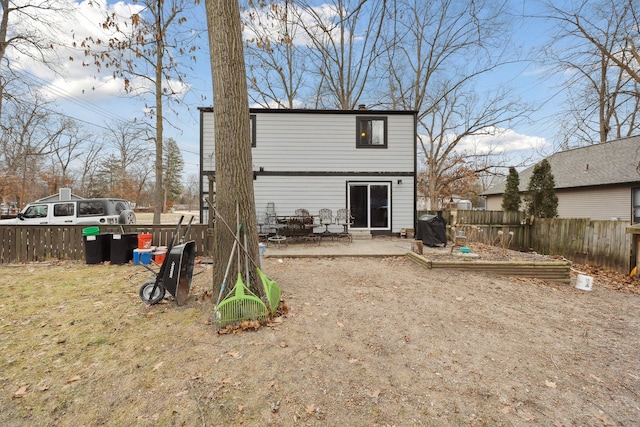 back of property with a patio area