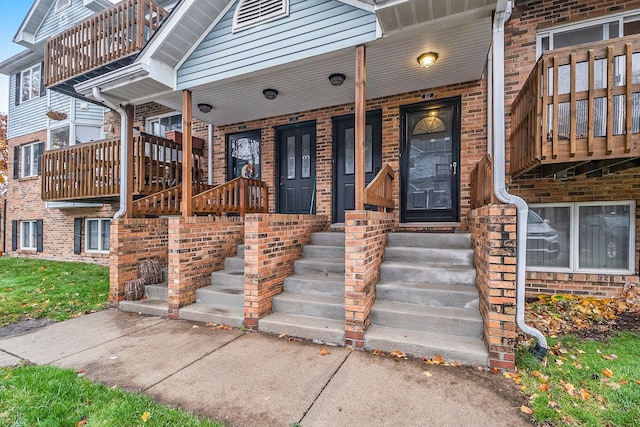 doorway to property with a porch