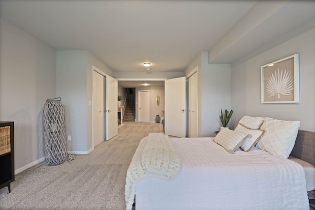 carpeted bedroom with a closet