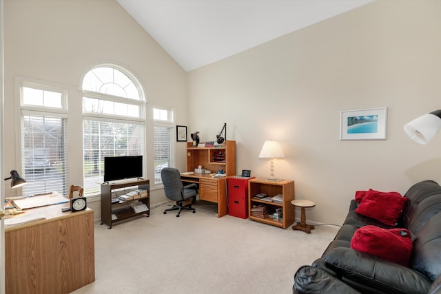 office featuring light colored carpet and high vaulted ceiling