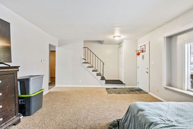 bedroom featuring carpet