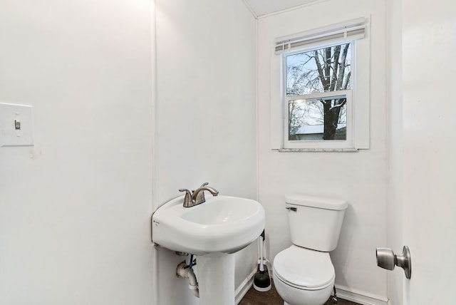 bathroom featuring toilet