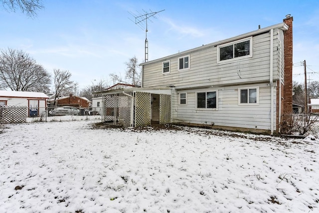 view of snow covered property