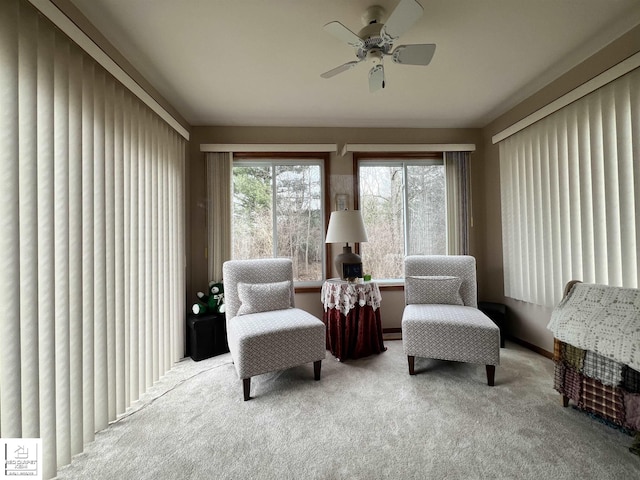 sunroom with ceiling fan