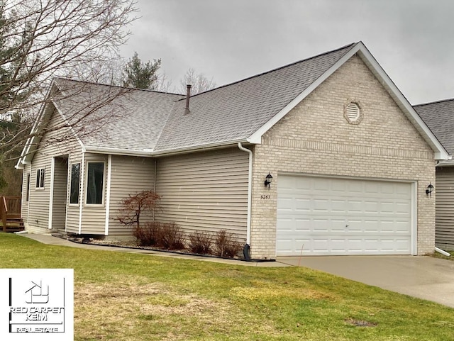 exterior space with a lawn and a garage