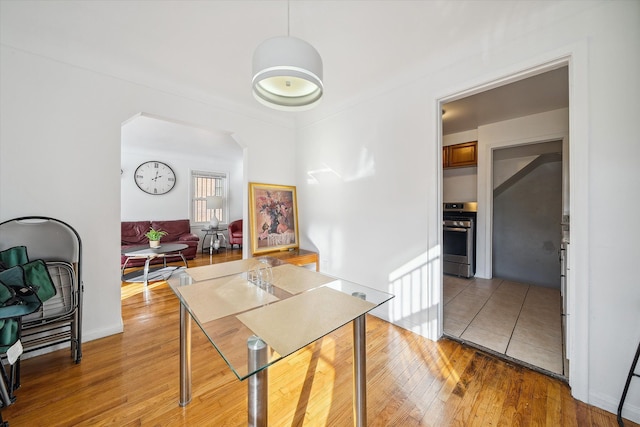 dining space featuring light hardwood / wood-style floors