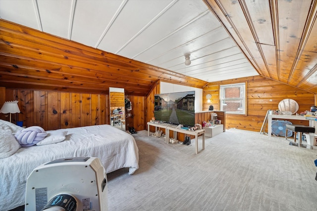 carpeted bedroom with wood ceiling, wooden walls, and vaulted ceiling