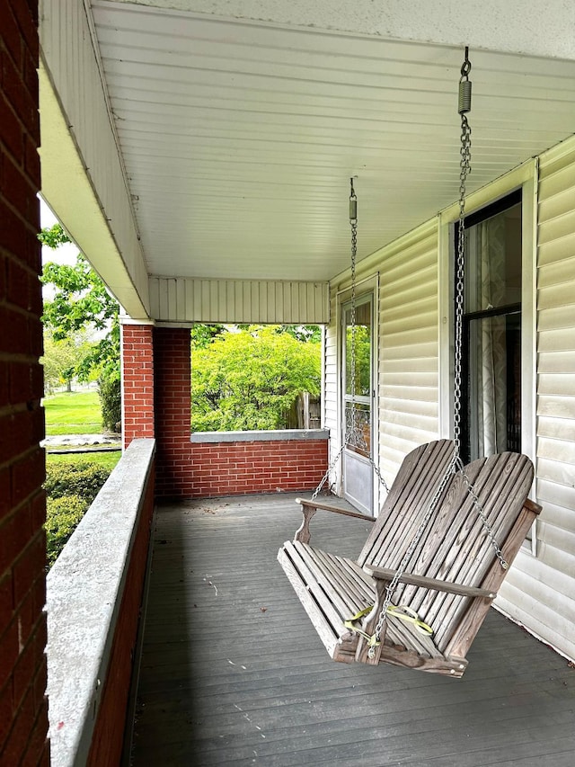 wooden deck featuring a porch