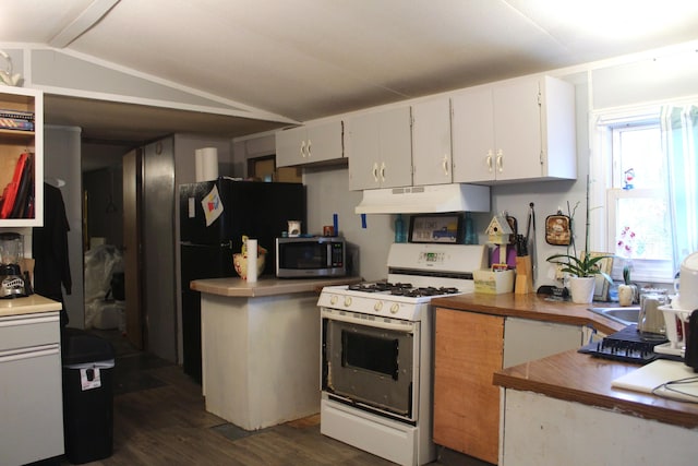 kitchen featuring lofted ceiling, white cabinets, black refrigerator, dark hardwood / wood-style floors, and white gas range