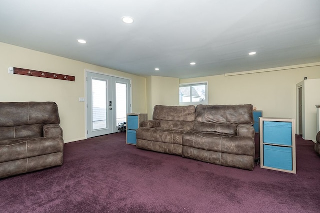 carpeted living room featuring french doors