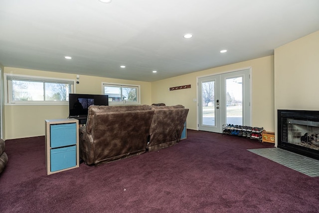 carpeted living room with french doors