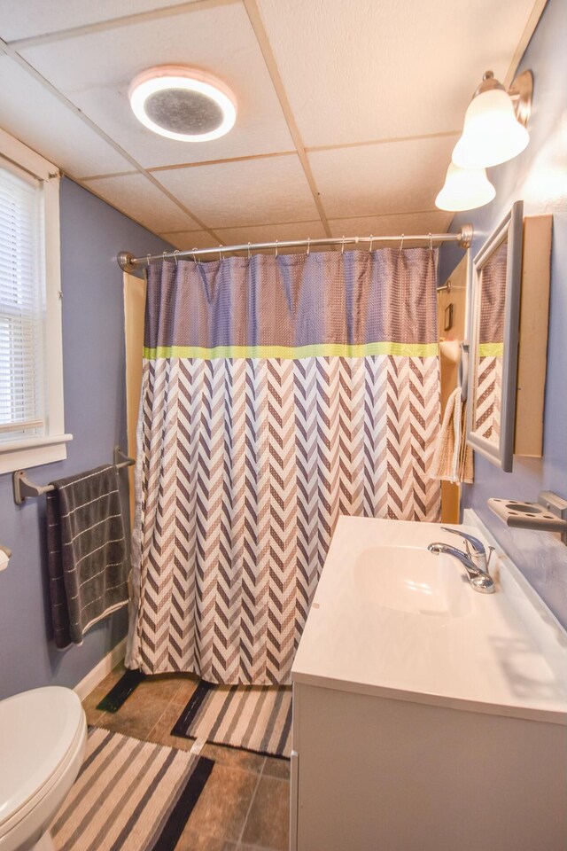 118 S Railroad St, Allen, MI 49227 - bathroom featuring vanity, a paneled ceiling, toilet, and walk in shower
