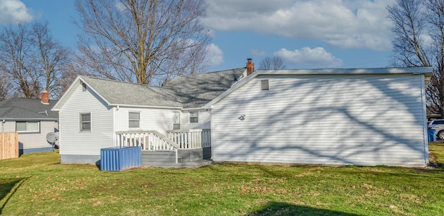 118 S Railroad St, Allen, MI 49227 - rear view of house with a lawn
