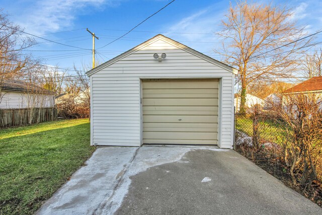 garage with a lawn