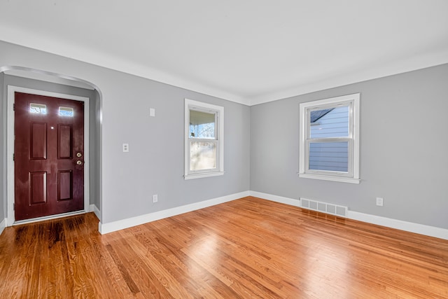 entrance foyer featuring hardwood / wood-style floors