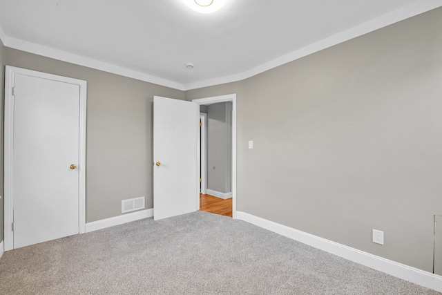 unfurnished bedroom with carpet