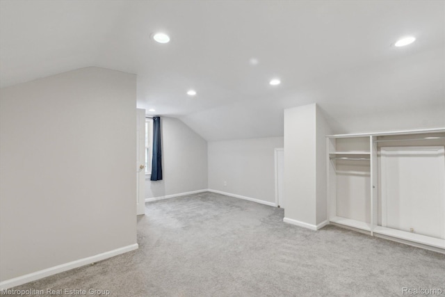 1597 W Saratoga St, Ferndale, MI 48220 - additional living space with vaulted ceiling, carpet, and recessed lighting