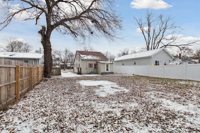 view of snow covered house