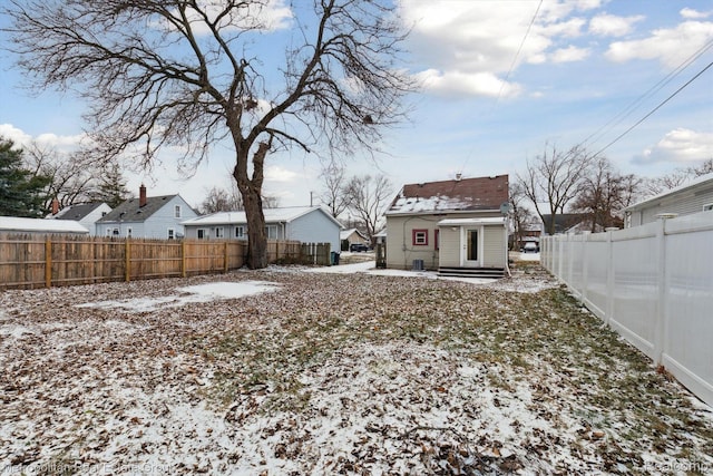 1597 W Saratoga St, Ferndale, MI 48220 - yard layered in snow with a fenced backyard and a residential view