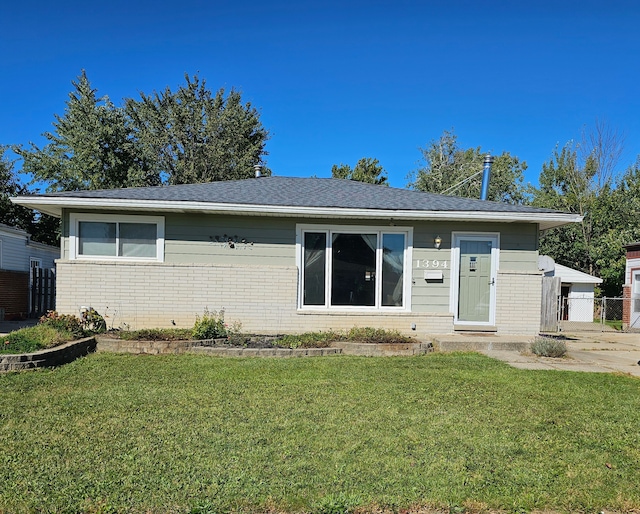 view of front of home with a front yard