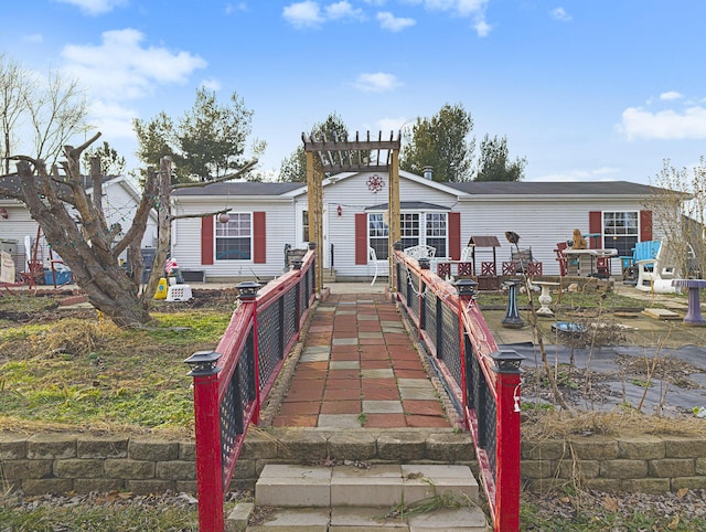 manufactured / mobile home featuring a patio