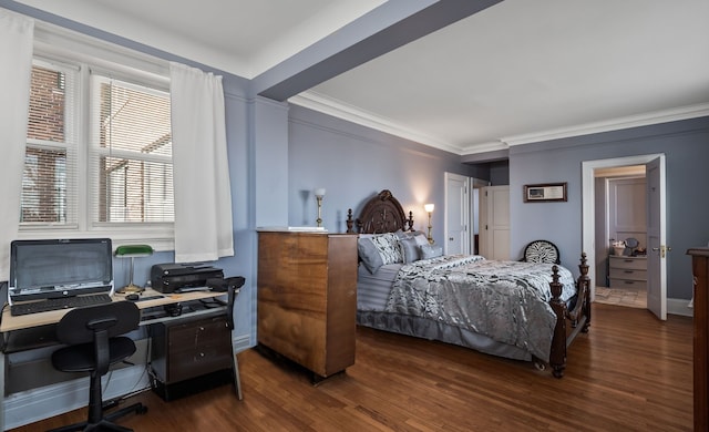 bedroom featuring ornamental molding and wood finished floors