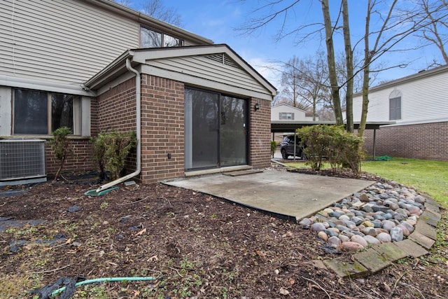 back of property featuring a patio area and central air condition unit