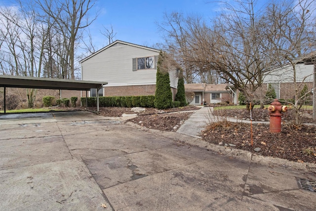 exterior space featuring a carport