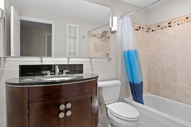 full bathroom with shower / bath combo with shower curtain, vanity, and toilet