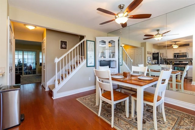 dining area featuring dark hardwood / wood-style flooring