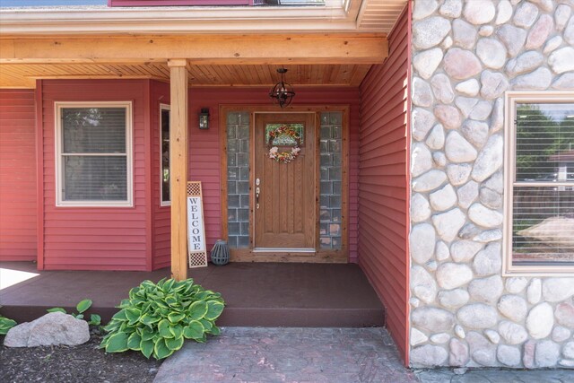 210 E Mcneil St, Corunna, MI 48817 - property entrance with covered porch