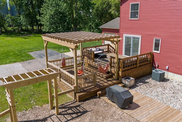 wooden deck with a lawn, a pergola, and central AC