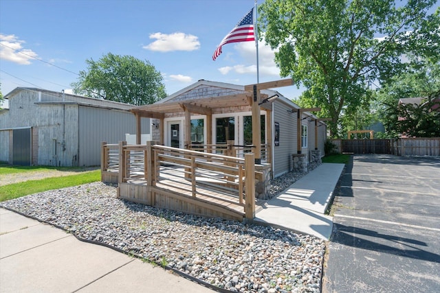 view of front of house featuring a pergola