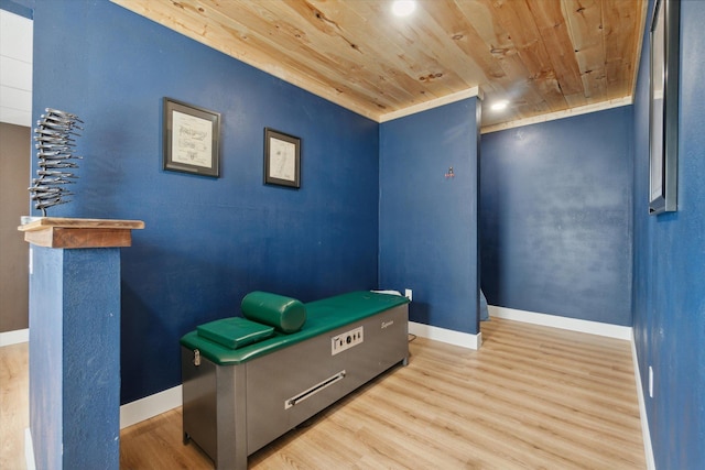 game room with hardwood / wood-style floors and wooden ceiling