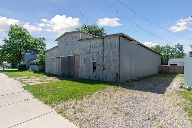 view of outdoor structure featuring a yard