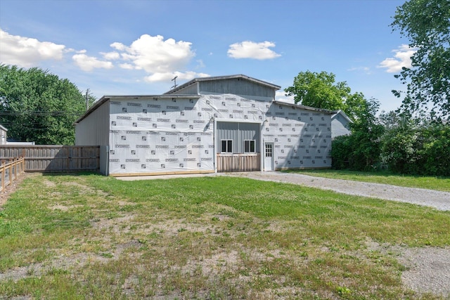 view of outdoor structure with a yard