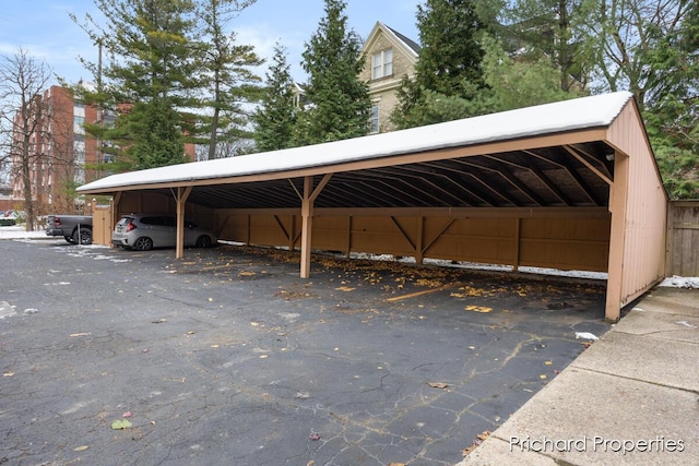 view of parking featuring a carport