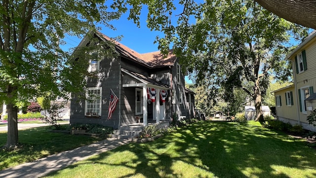 view of property exterior with a yard