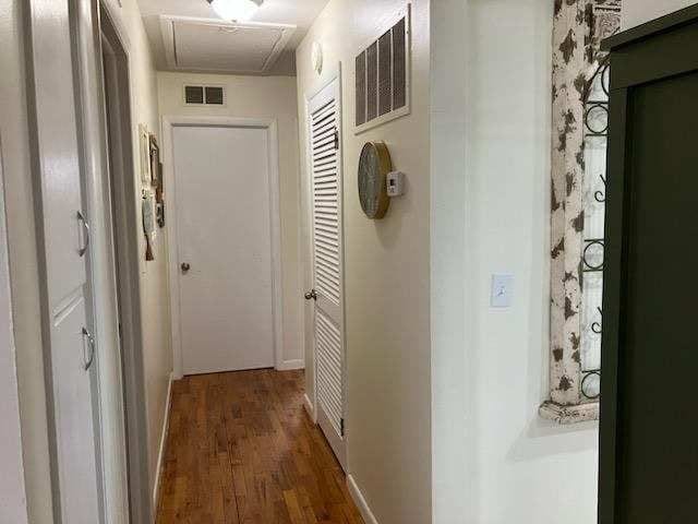 hall featuring dark hardwood / wood-style floors